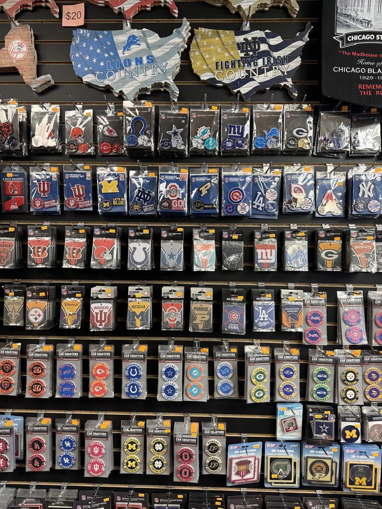 Racks of team magnets, air fresheners and car coasters