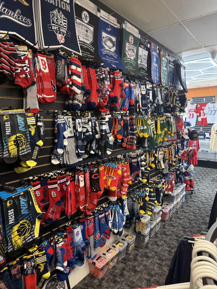 A wall of team socks in every color