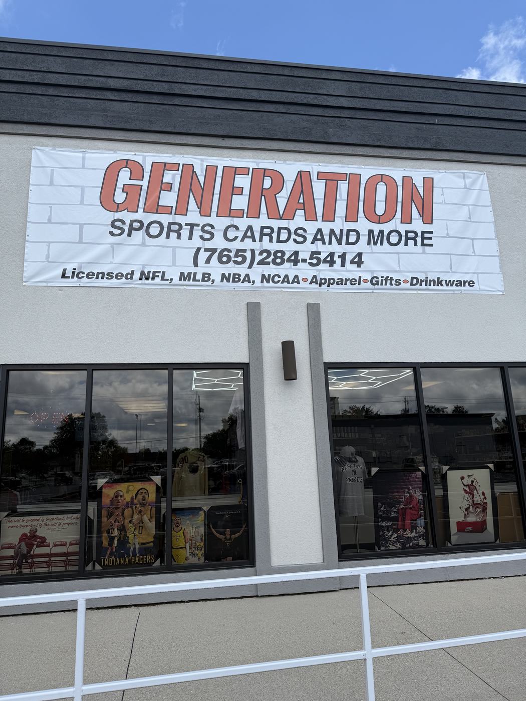 The Generation Sports Cards and More storefront banner above the shop windows